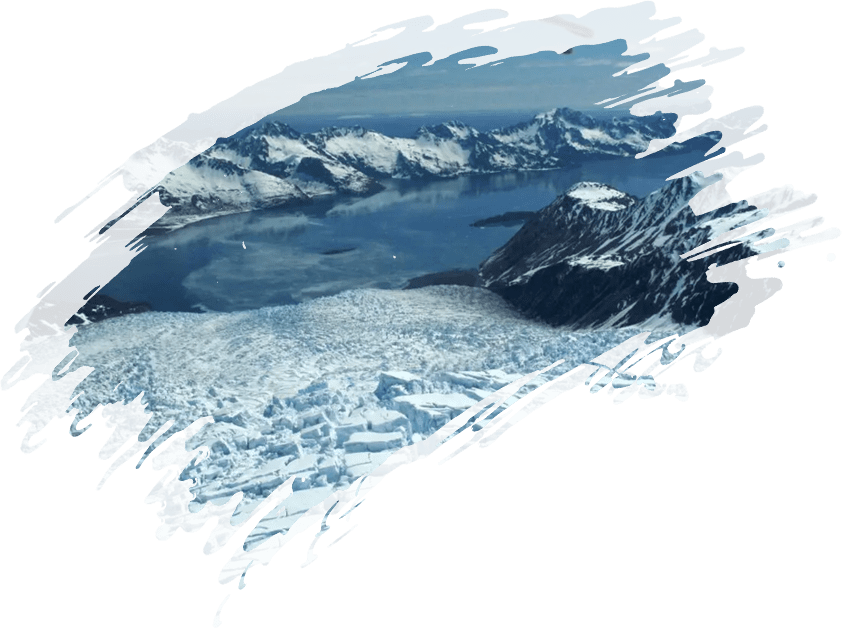 An image of a glacier with mountains in the background.